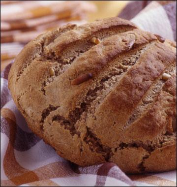 Avec quelle farine pétrit-on la pâte qui donnera le pain de l'arbre, en Ardèche ?