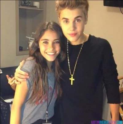 Avec qui Justin a-t-il signé un contrat en septembre 2012 ?