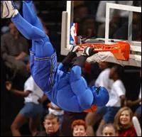 Vous avez sûrement vu G-Man, la mascotte des Wizards, lors du concours de dunk du All Star Game 2014. Quel joueur a ainsi aidé à remporter le trophée ?