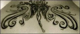 À quelle actrice de Glee appartient cette fée dans le bas du dos ?