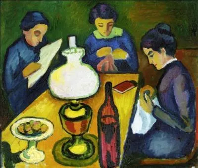 Trois femmes à table sous la lampe.