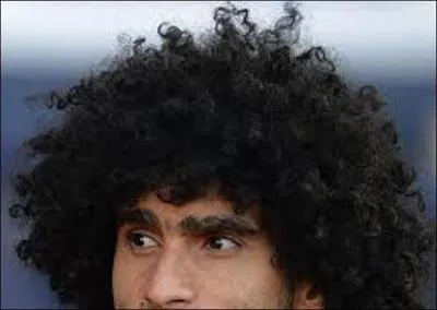 Sa coiffure suffit à l'identifier...