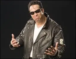 Ce lutteur a connu une courte carrière à la WWE où, de 2007 à 2009, il incarna notamment le personnage de Deuce dans l'équipe "Deuce n'Domino". De quelle ancienne grande star est-il le fils adoptif ?