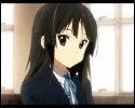 'K-On ! ' : Akiyama Mio joue de la guitare dans le groupe 'Houkago Tea Time'.