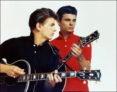 Claude François chante " Belles ! Belles ! Belles ! " adaptation de "Girls Girls Girls " de / des :