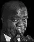 Le célébrissime Louis Armstrong jouait de ------ trompette.