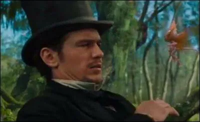 Quelle est la formule prononcée par Oz lorsque celui-ci fait semblant de lancer un sort ?