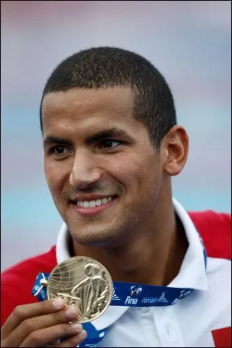 Champion olympique des 10 km natation... je suis :