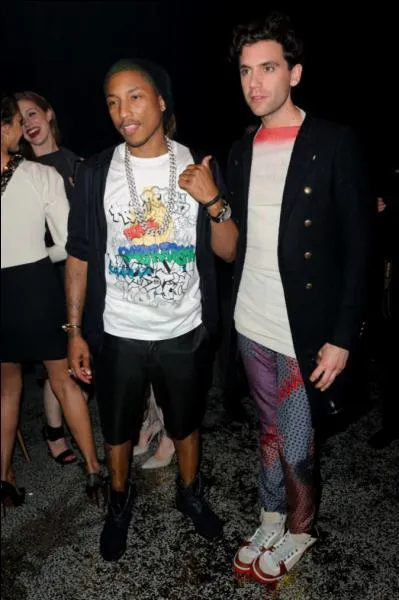 Dans quelle chanson était-il accompagné de Pharell Williams ?