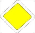 Que signifie ce panneau en forme de losange à fond jaune et à rebord blanc ?