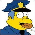 C'est le chef de la police de Springfield. Il est paresseux et facilement corruptible !