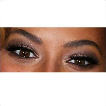 A qui sont ces yeux marron ?