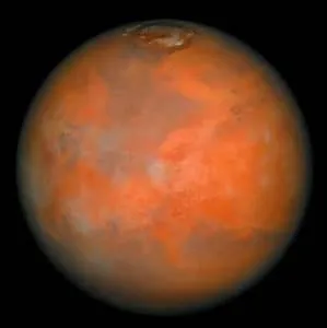 Cette planète doit sa couleur rouge à ses roches pleines de rouille et son ciel rosi par les tempêtes de poussière. Elle est creusée de canaux semblables à des lits de rivières asséchées, mais il n'y a pas d'eau. On y trouve des vallées profondes et d'anciens volcans. Quelle planète est-ce ?