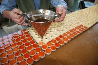 Quel fruit entre dans la composition du cotignac, spécialité de la ville d'Orléans ?