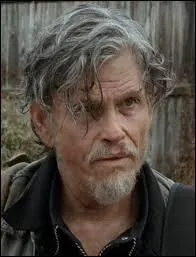 Dans la saison 4, comment se nomme le chef du groupe avec qui Daryl reste ?