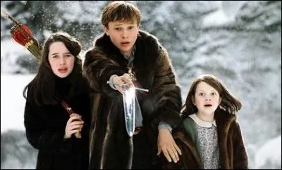 "Nous sommes fatigués de vous suivre", comment s'appelle le loup qui dit cela aux Pevensie ?