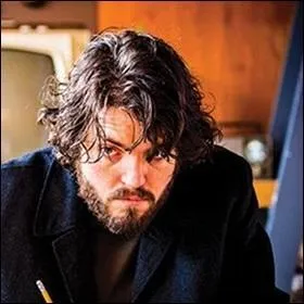 Qui est l'homme sur la photo ci-dessous :