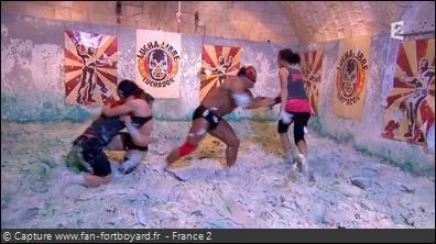 Dans quelle cellule se trouve l'épreuve "Lutte dans la boue" (en 2014) ?