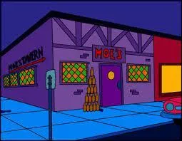 Quel bâtiment se situe à côté du bar de Moe ?