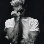 De quel chanteur a-t-il repris certains textes ?