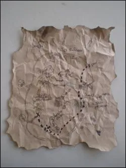 La carte au trésor est ... . Le pirate aura du mal à trouver la malle pleine de pièces d'or dont il rêve.