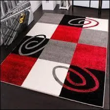 Je suis noir, je deviens rouge et je finit blanc...