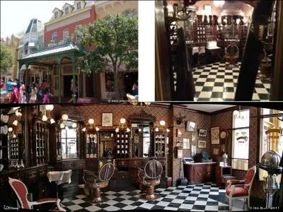 Dans n'importe quel Disneyland, et plus précisément dans chaque « main street USA», vous retrouverez toujours la même échoppe. Il semble que c'est un hommage de Walt à son père. Quel est ce commerçant ?