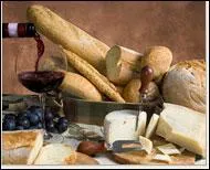 Histoires de partitifs. 
Que doit-on dire ?
C'est l'heure de manger du pain, du fromage et de boire du vin.
