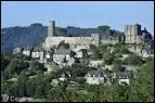 A quelques kilomètres de Brive, sur la rive gauche de la Tourmente, c'est un enchevêtrement de toits gris bleutés sous la protection d'un château fort haut perché.