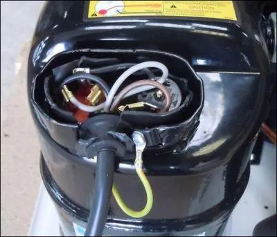 D'après cette photo, ce compresseur est :