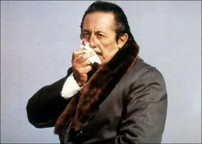 Dans le film "Tandem", quel est le métier de Jean Rochefort ?