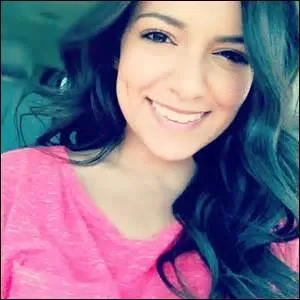 Quel est le titre de la chanson qu'elle a chantée et composée en 2014 ?