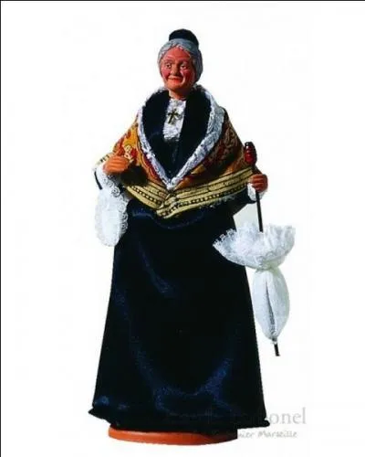 Elle s'approche vers la crèche ne voulant pas rater l'enfant Jésus. Quel est le nom de ce santon ?