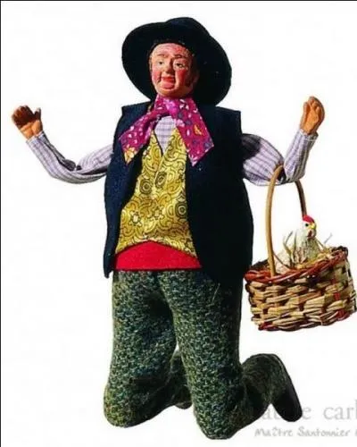 Homme reprsent  genoux, les bras levs. C'est un personnage trs populaire et indispensable  la crche. Quel est le nom de ce santon ?