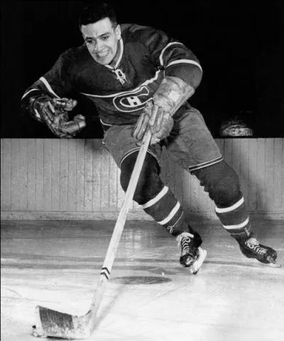 Bernard "Boum Boum" Geoffrion, reconnu pour son lancer frappé du tonnerre, était le gendre de Howie Morenz. Son numéro est donc allé rejoindre celui de son beau-père, lequel était-ce ?