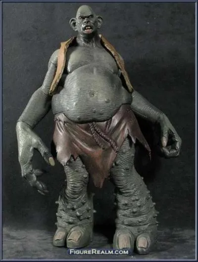 Je suis dépourvu d'intelligence et stupide. Je mesure plus de cinq mètres. Je suis très violent et imprévisible. Je m'exprime avec des grognements. Qui suis-je ?