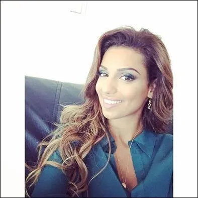 Quelle ville Tal habite-t-elle en 2014 ?