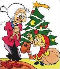 Mais à qui le lutin remet-il ce cadeau de Noël ?