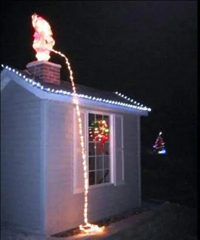 Quel est le nom de la fontaine représentant un petit garçon en train d'uriner ici parodié en Père Noël ?