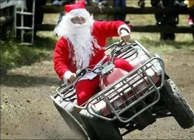 Véhicule tout terrain monoplace (ou biplace) à trois ou quatre roues pouvant remplacer avantageusement le traîneau du père Noël =