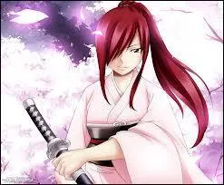 Qui a élevé Erza ?