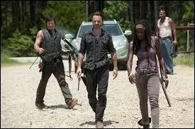 Qui accompagne Rick, pour se rendre à Woodbury ?