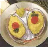 Nous quittons Le Gosier pour Saint-François où une entrée très représentative de la culture antillaise nous est proposée, faite à base de morue séchée, d'avocats, de manioc et de cive, de quoi s'agit-il ?