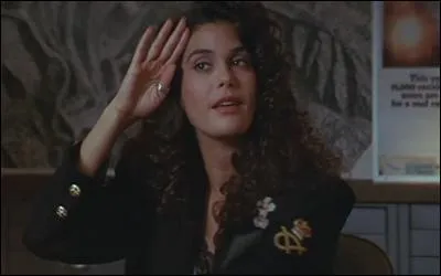 Dans "Tango et Cash", quel est le métier de la sur de Tango incarnée par Teri Hatcher ?