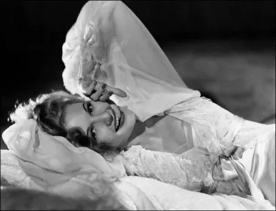 Reggiani chantait "La femme qui est dans mon lit ...", mais quel était son prénom ?