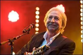 Henri Destraz est un artiste, célèbre pour ses compositions et interprétations de chansons pour enfants. Sous quel pseudonyme est-il bien plus connu ?