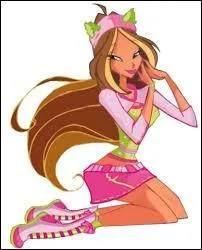 Un jour, lorsque Flora était assise au coin d'un arbre, que lui a lancé Helia pour attirer son attention ?