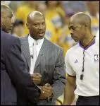 Quel est l'homme du milieu ?