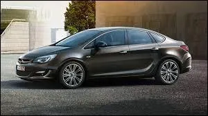 Regardez-bien cette image. Elle vous donnera le nom de cette voiture, qui est une ...