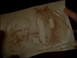 Saison 3 - Qui offre ce dessin à Caroline ?